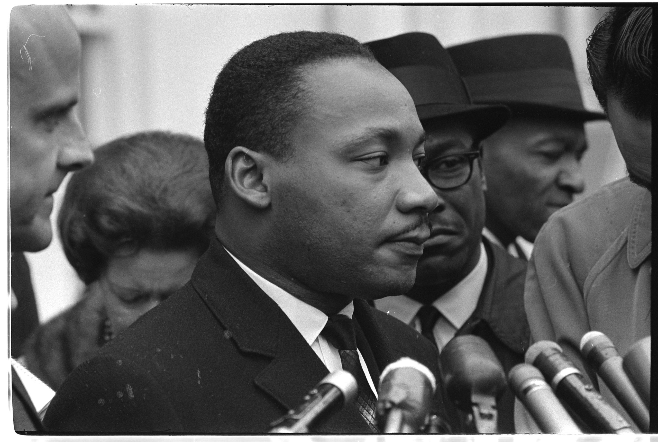Dr. Martin Luther King Jr. standing at a podium