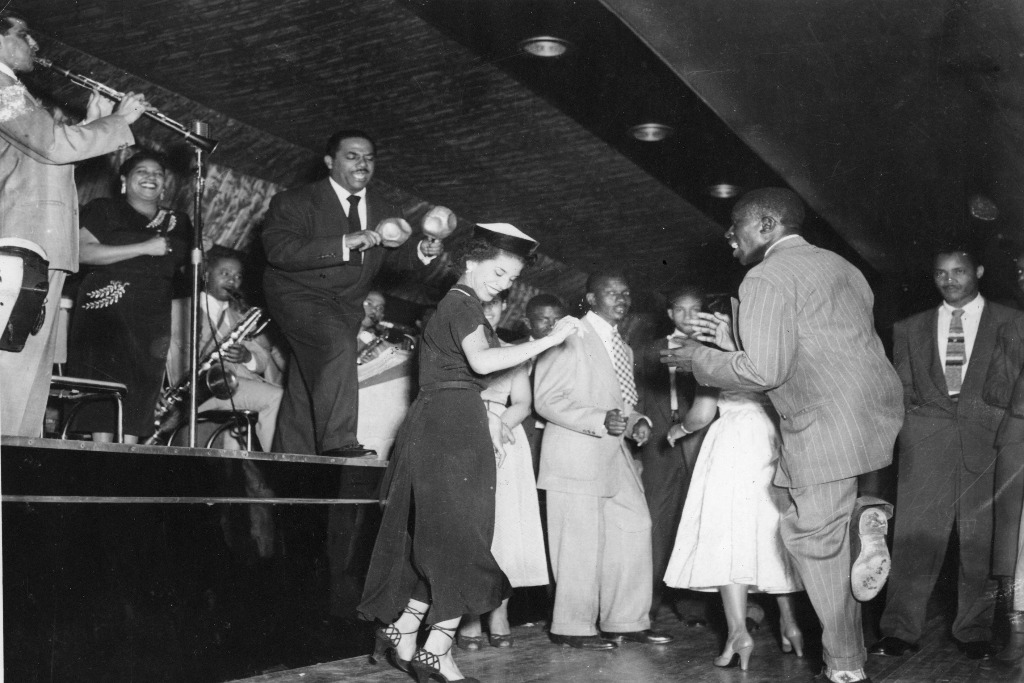 A group of people dancing in a Harlem club